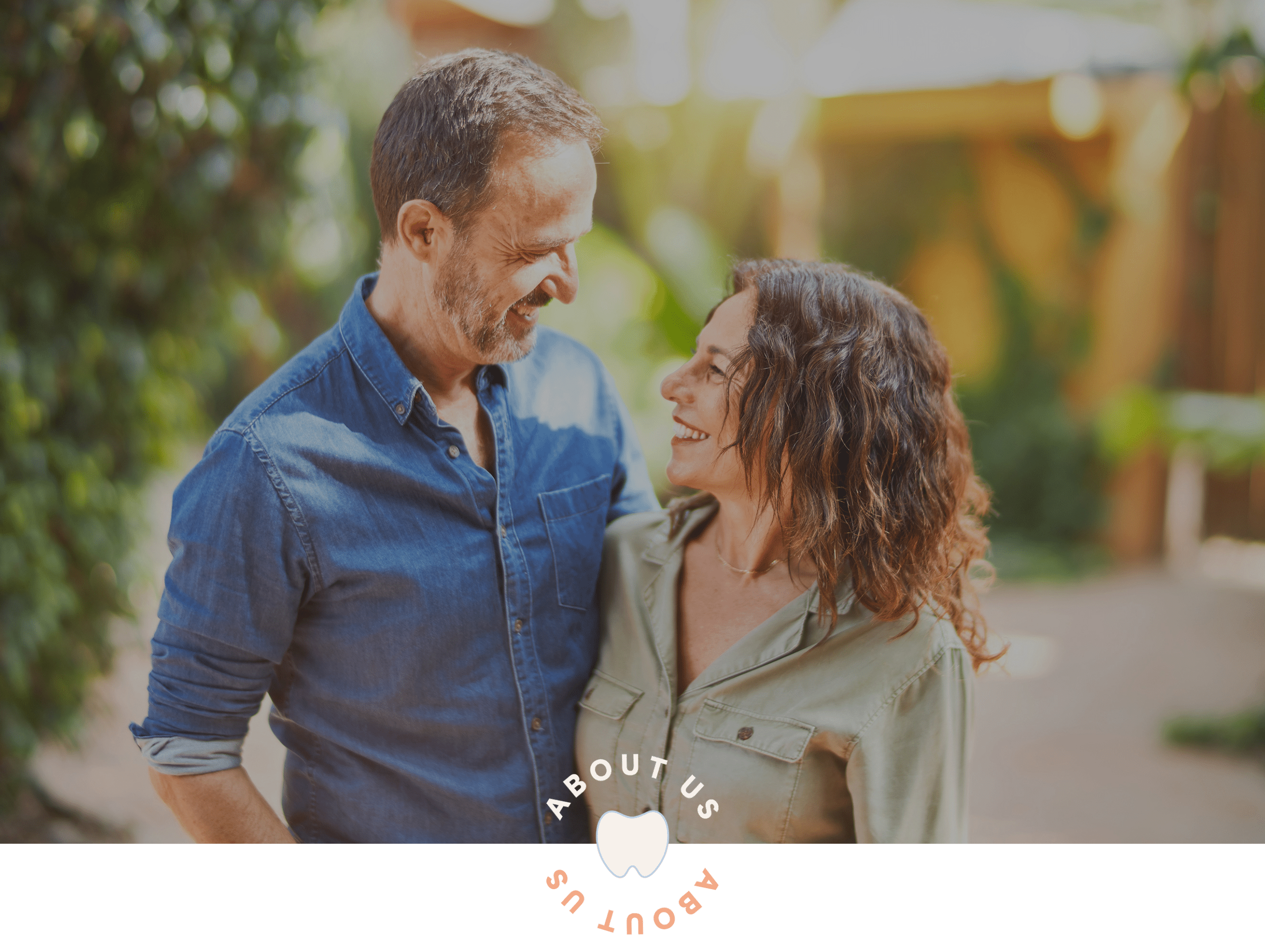 man and woman smiling after a dental appointment at inspired smiles