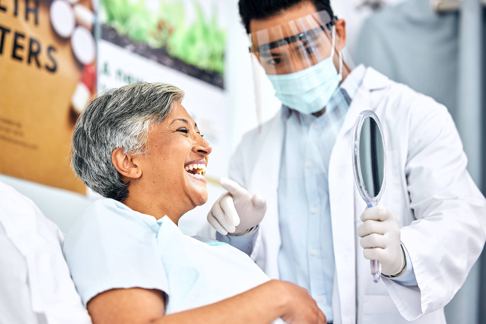 dental patient with dr pham during tooth extraction appointment at inspired smiles