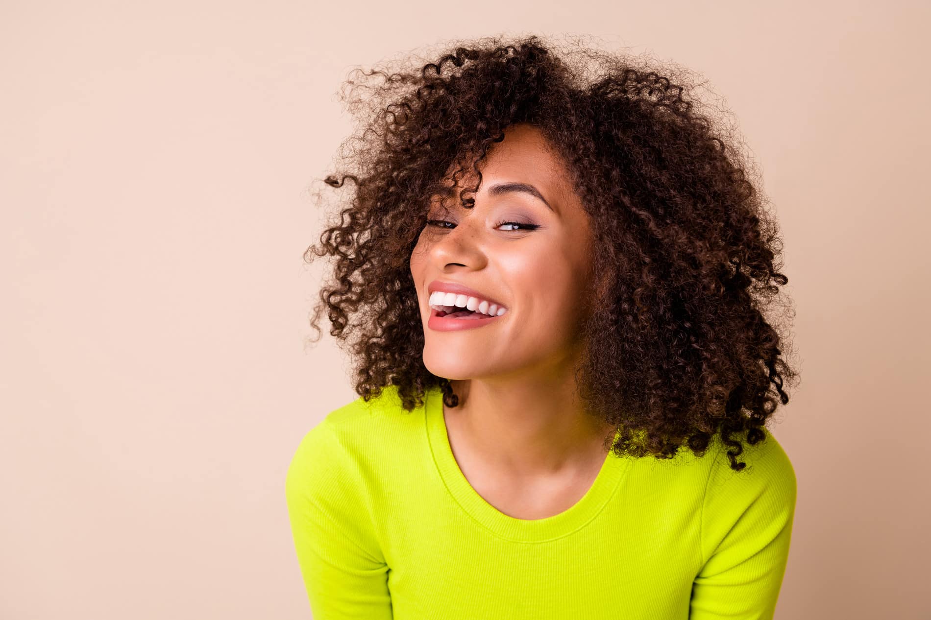 Woman happy with her veneers from Inspired Smiles in Burnsville MN