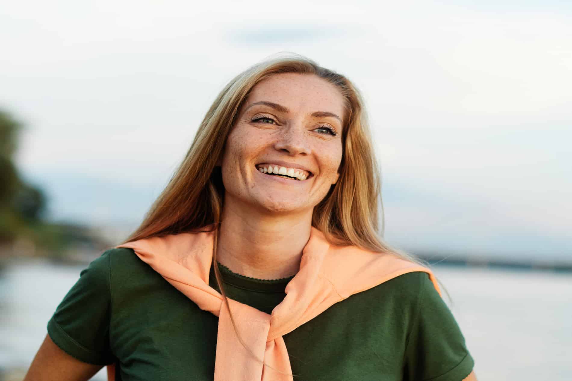 patient smiling after her same day crowns treatment from Inspired Smiles in Burnsville MN