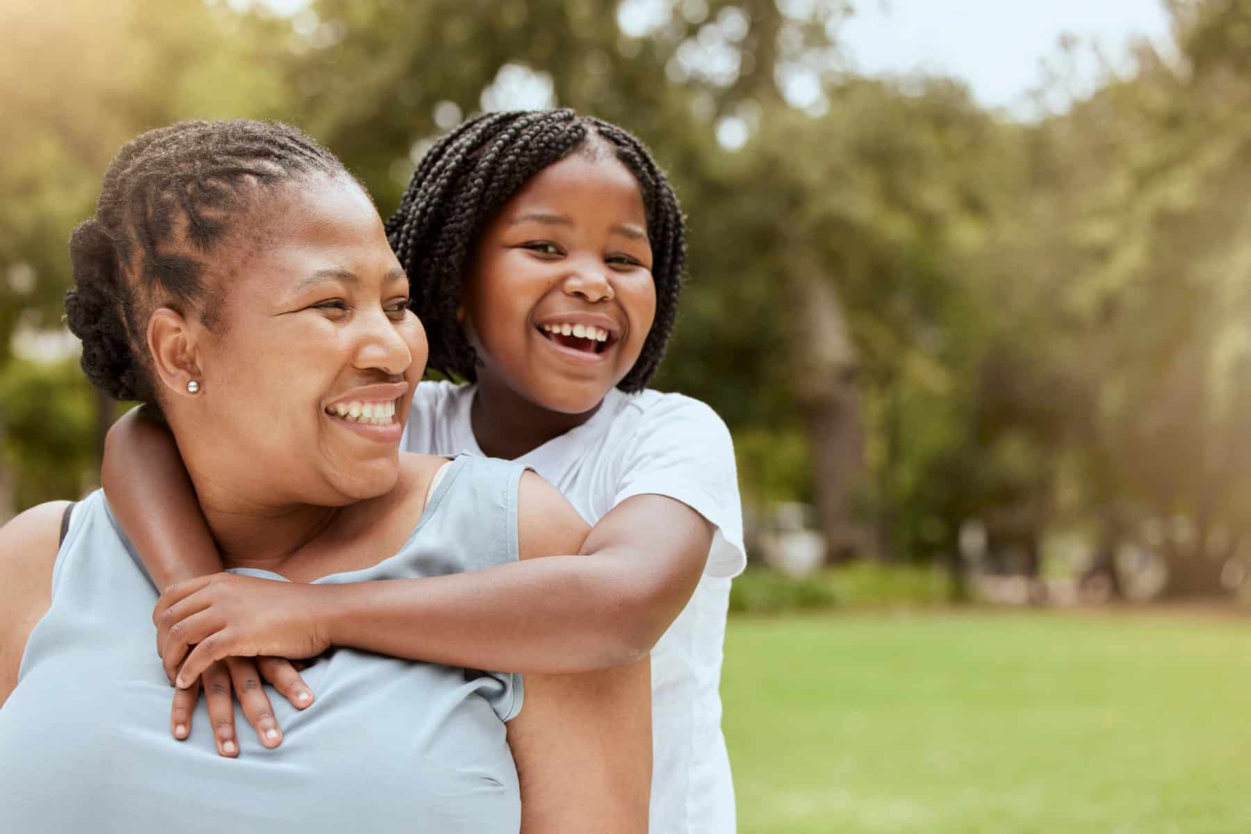parent and child satisfied with their dental sealants from Inspired Smiles in Burnsville MN