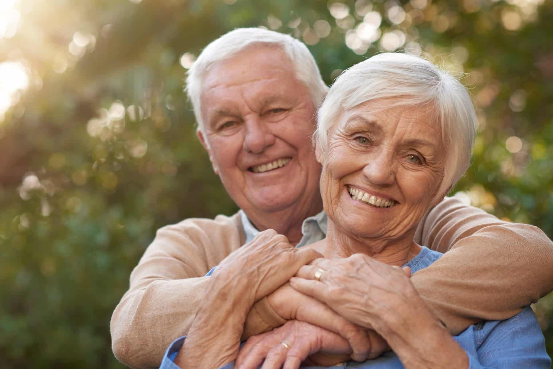 couple of patients satisfied with their dentures from Inspired Smiles in Burnsville MN